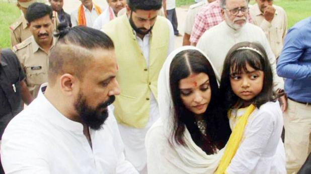 /aishwarya-rai-and-abhishek-visits-sangam-aishwarya-rai-bachchan-immerse-father-ashes